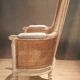 Louis XVI high-backed caned armchair