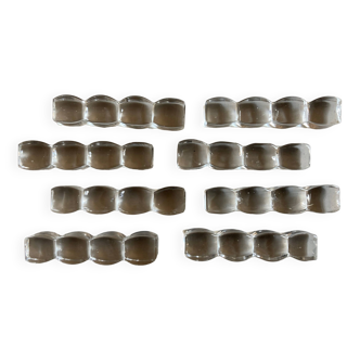 Set of 8 modernist crystal cushion knife holders ringing 1940
