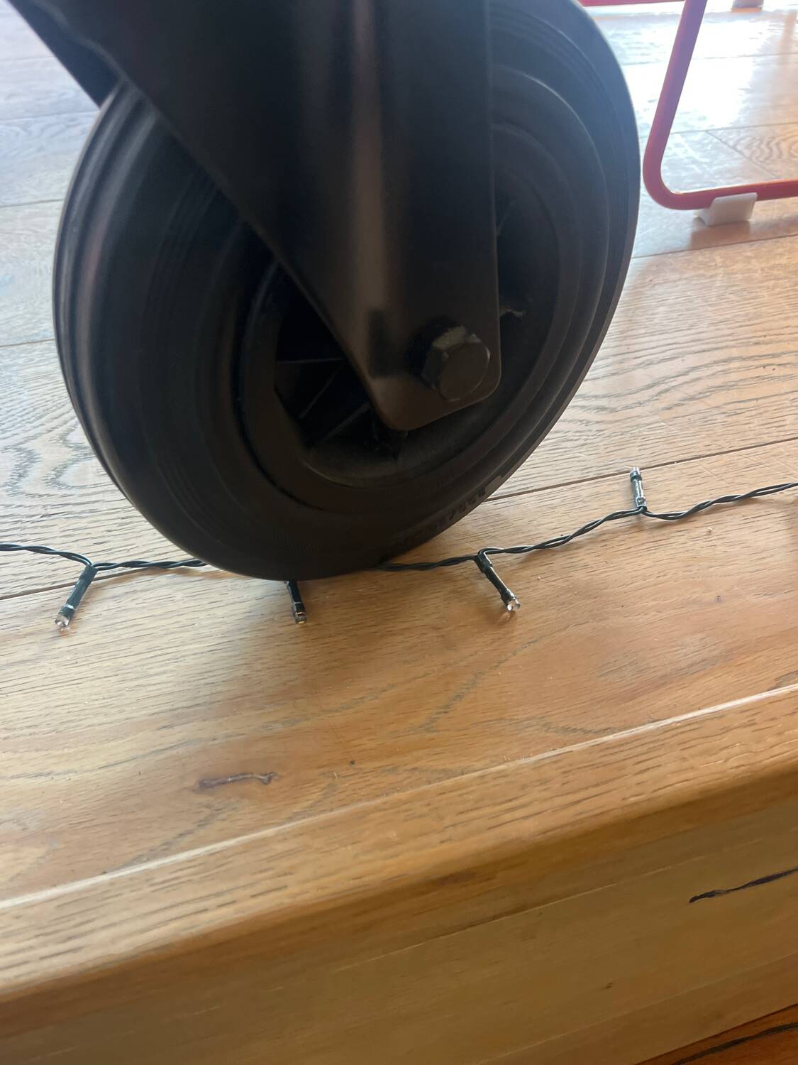 Gae Aulenti coffee table for Fontana Arte, transparent glass top with black cast iron supports, 1980s.