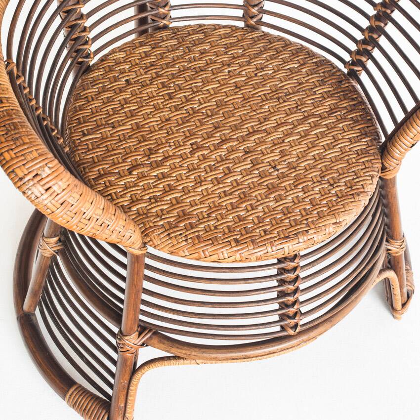 Vintage high armchair in cane/rattan. France, 1960s