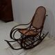 Rocking chair and his foot rest, in beech 1900