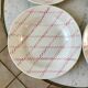 set of 4 hollow plates Badonviller pink rope pattern 30s