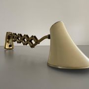 Cream metal and brass wall lamp with scissors design by Karl Lang for SIS Licht, 1950s, Germany.