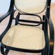 Rocking-chair vintage en bois courbé et cannage 1960