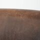 Elegant set of two sheepskin leather armchairs with beautiful round shapes