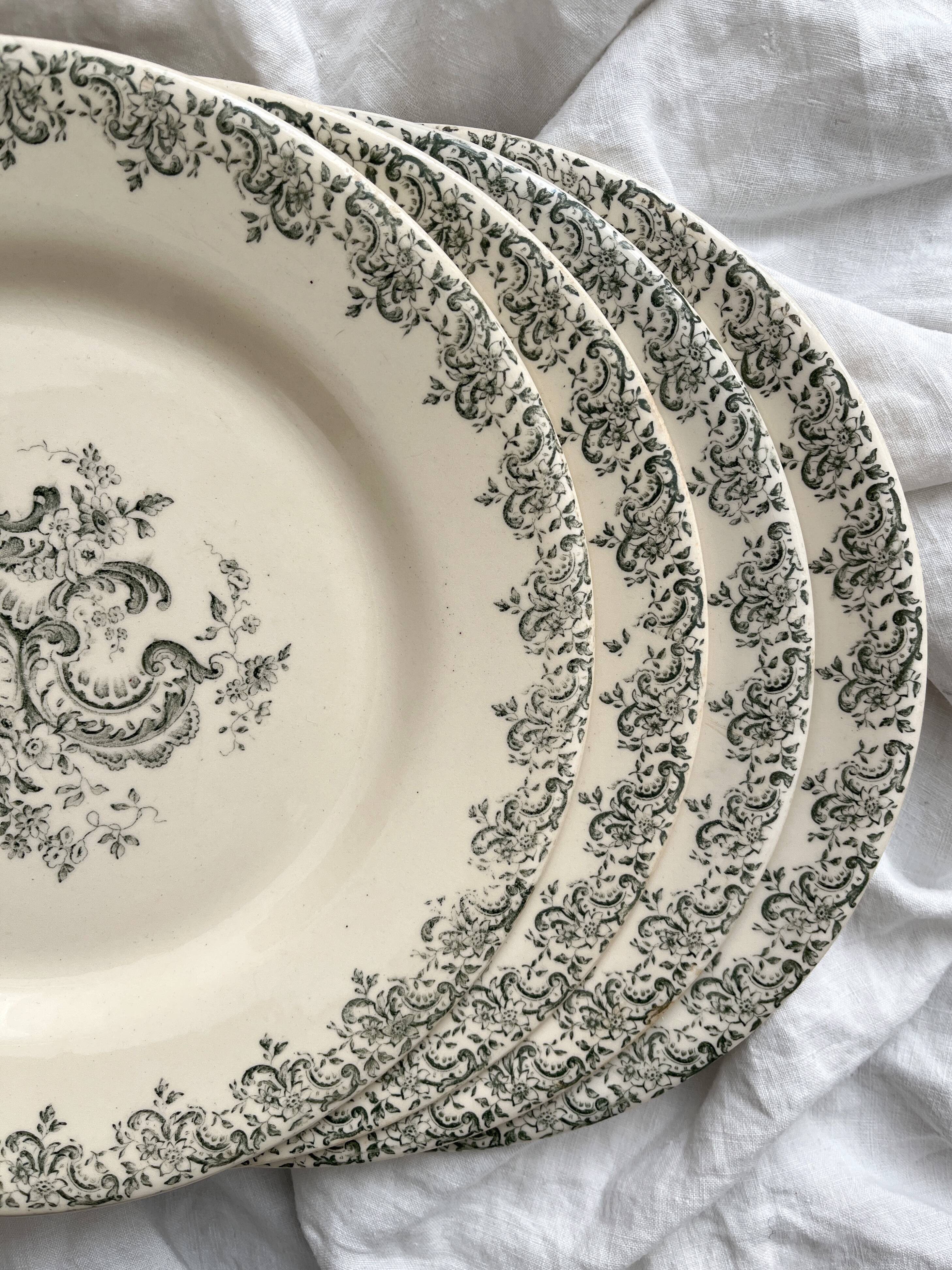 4 flat ironware plates "Louis XV" Gien 19th century