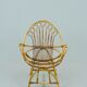 A pair of rattan chairs