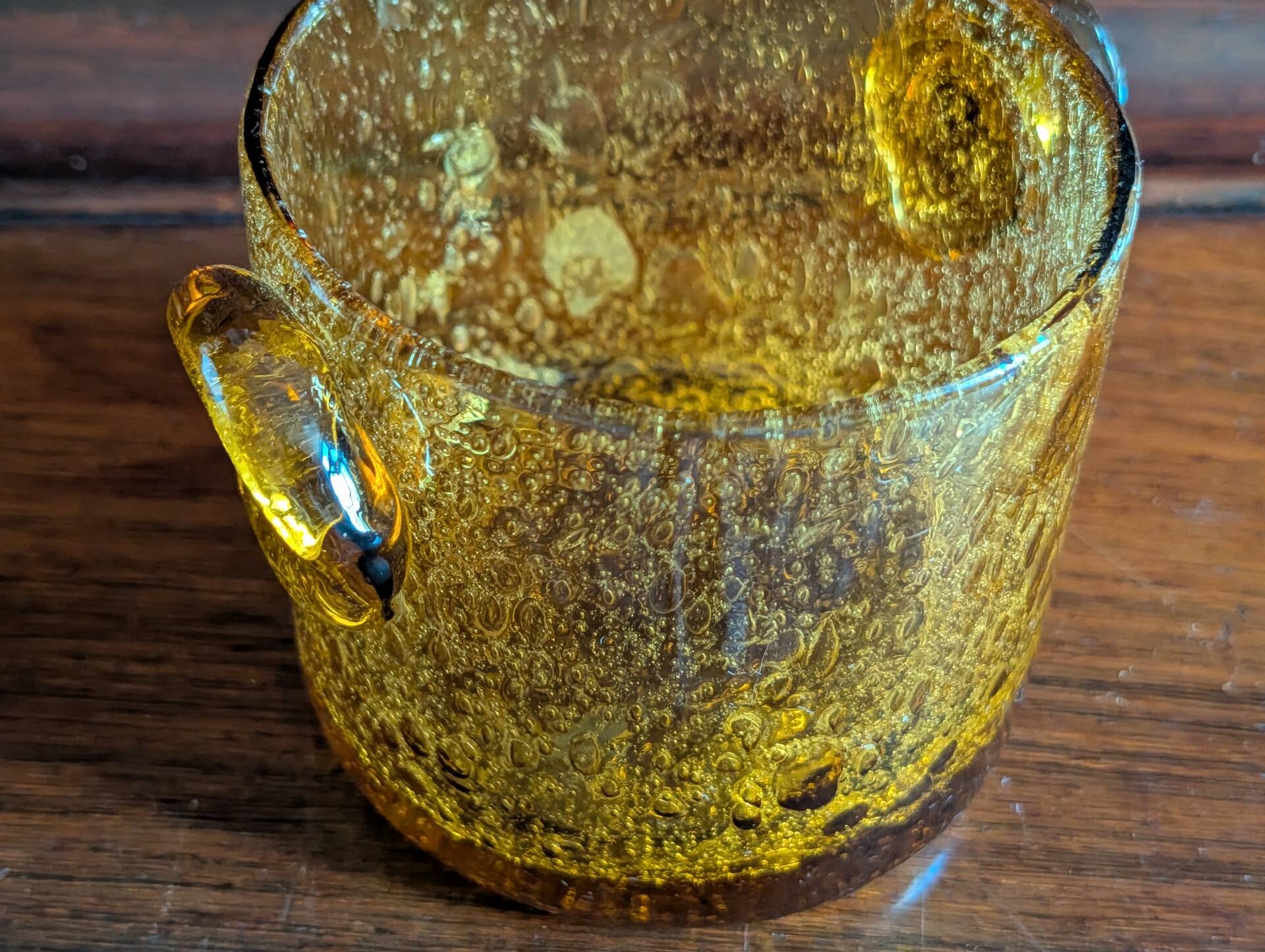 Small vase or amber bubbled glass tealight holder