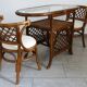 Rattan set with table and two armchairs.