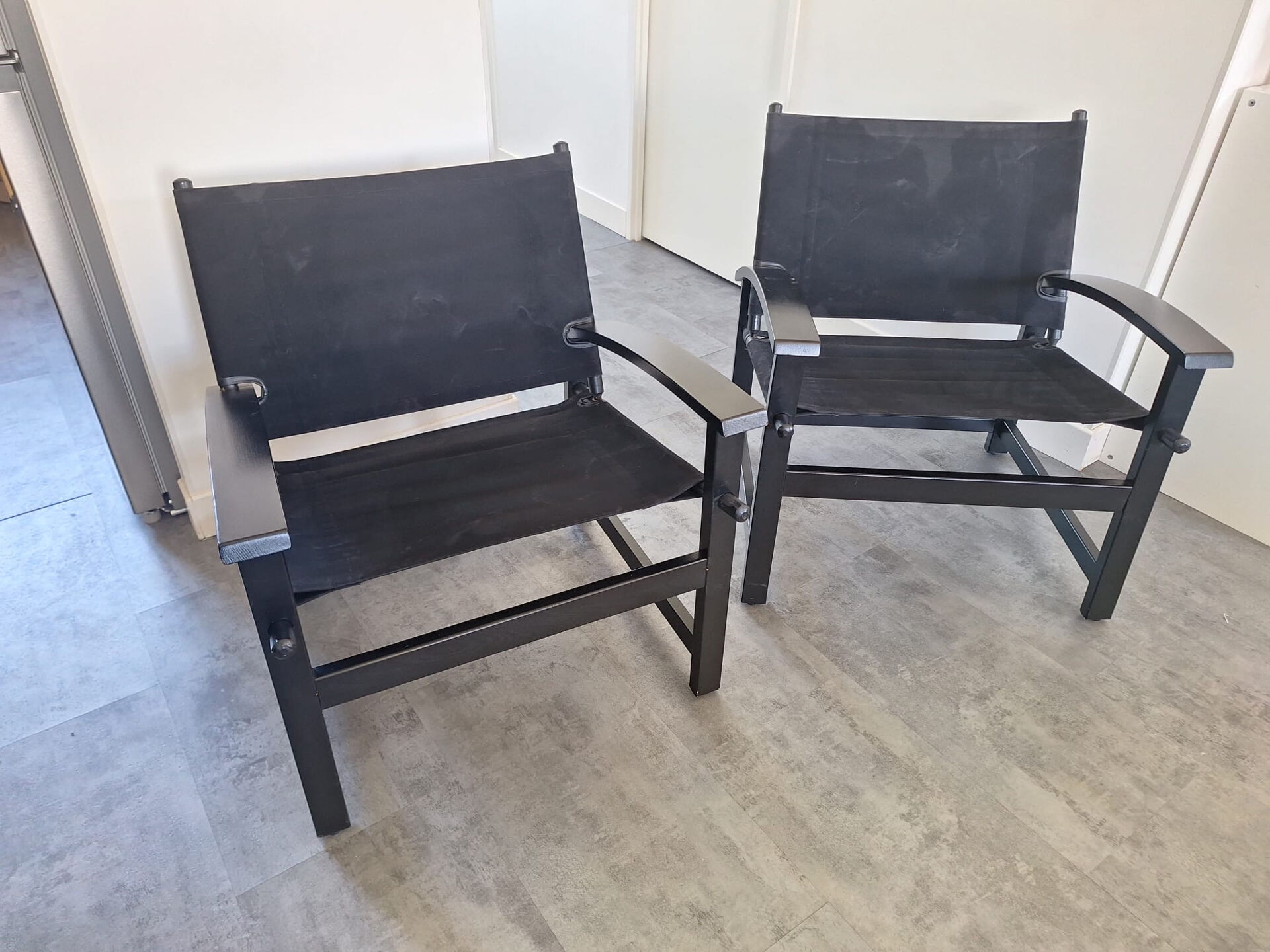 Pair of vintage "safari" style armchairs published by Hyllinge Møbler.