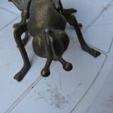 Old brass ashtray in the shape of a fly