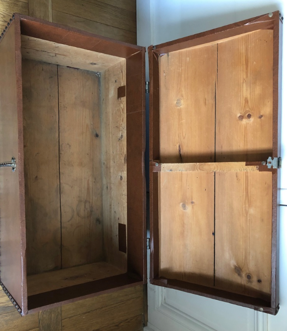 Ancient wooden and faux leather trunk