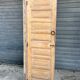 pair of old double-leaf doors with transom and carved frames