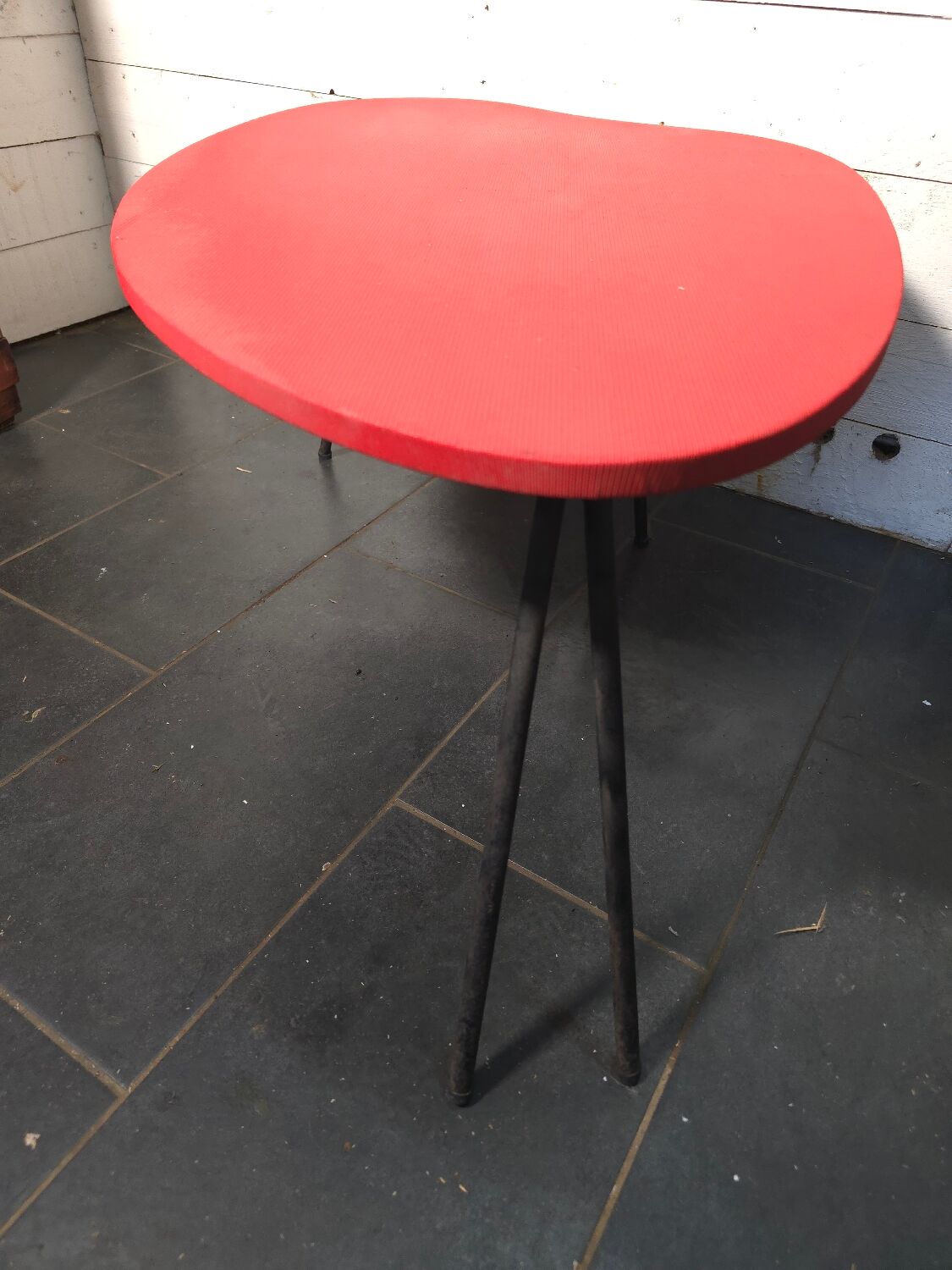 Vintage coffee table from the 1960s in red.