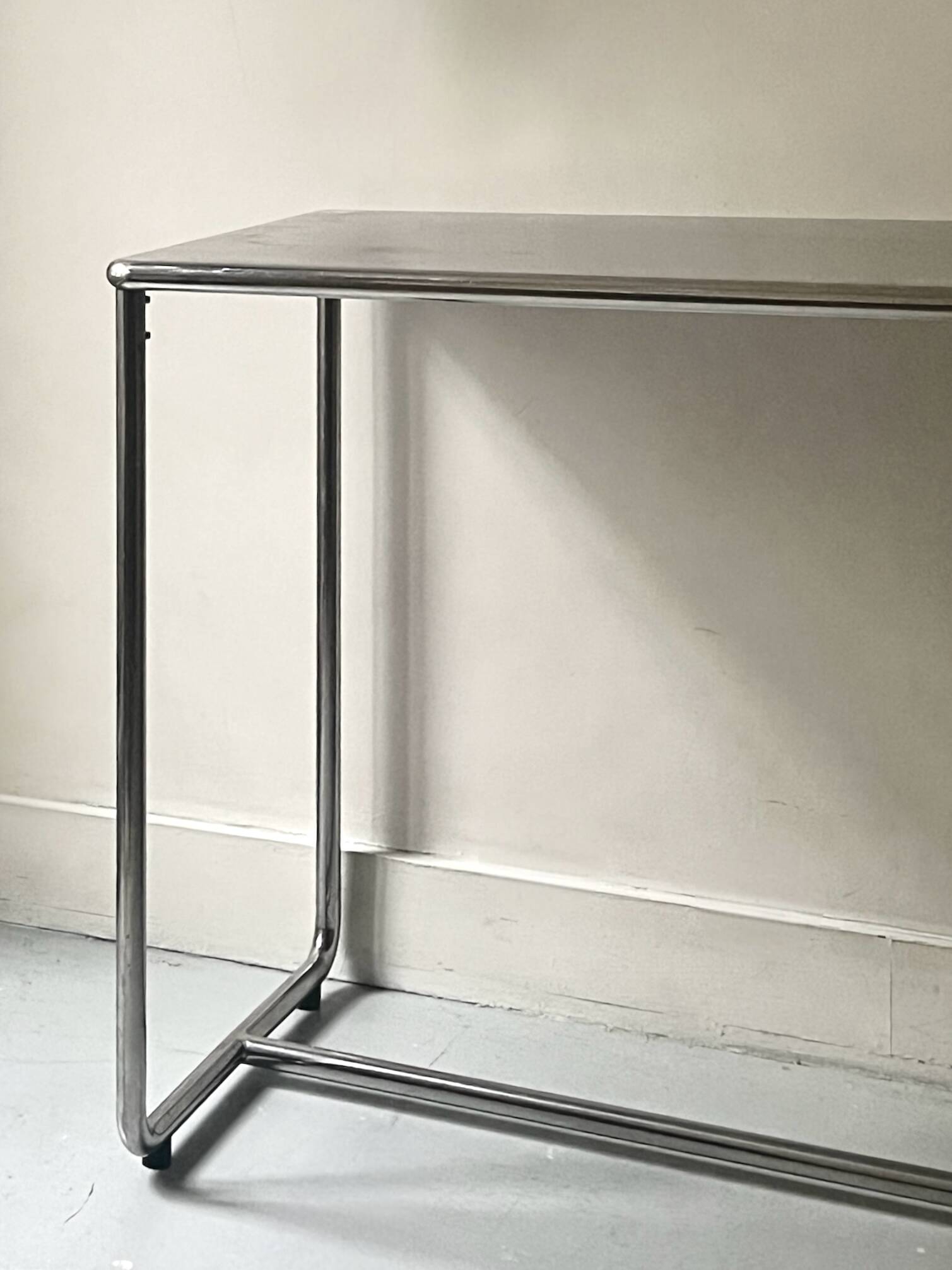 Dining table / tubular and modernist desk in chrome metal