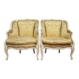 Pair of bergère armchairs in Louis XV style – carved wood and damask fabric