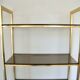 1970 library and gold metal and smoked glass