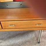 Scandinavian teak dressing table with a large round mirror.