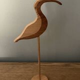 Wooden wading bird on a base