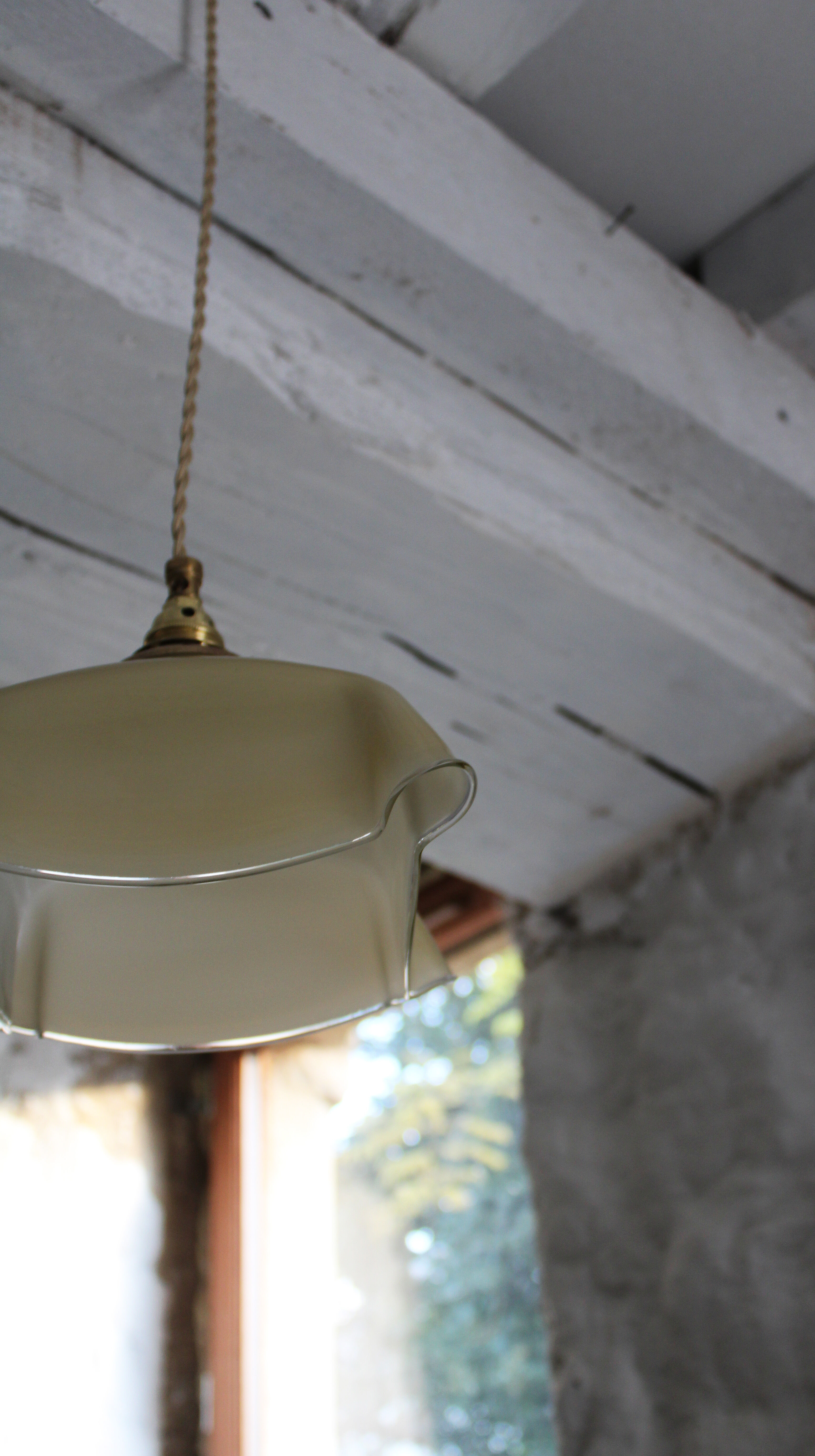 Draped opaline suspension