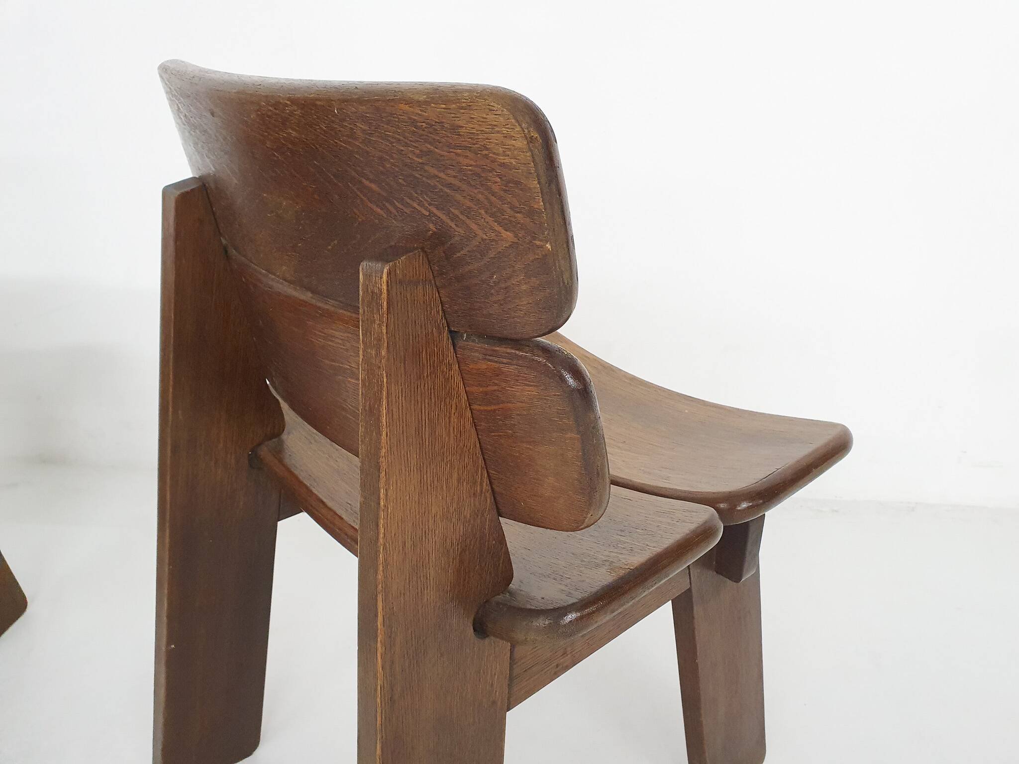 Set of four solid oak dining chairs, The Netherlands 1970's