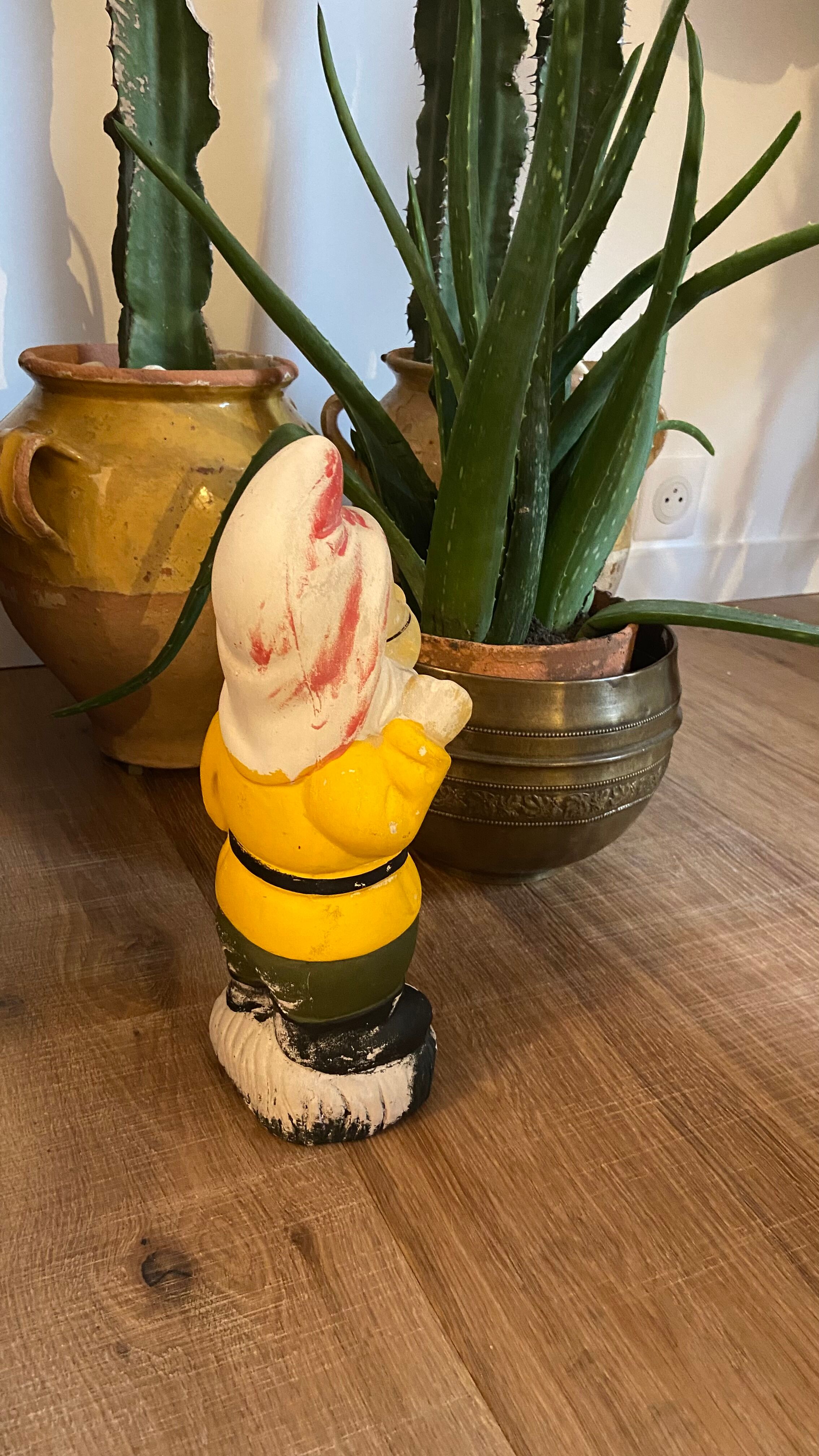 Ancient terracotta garden gnome