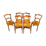 6 old chairs in cherry tree