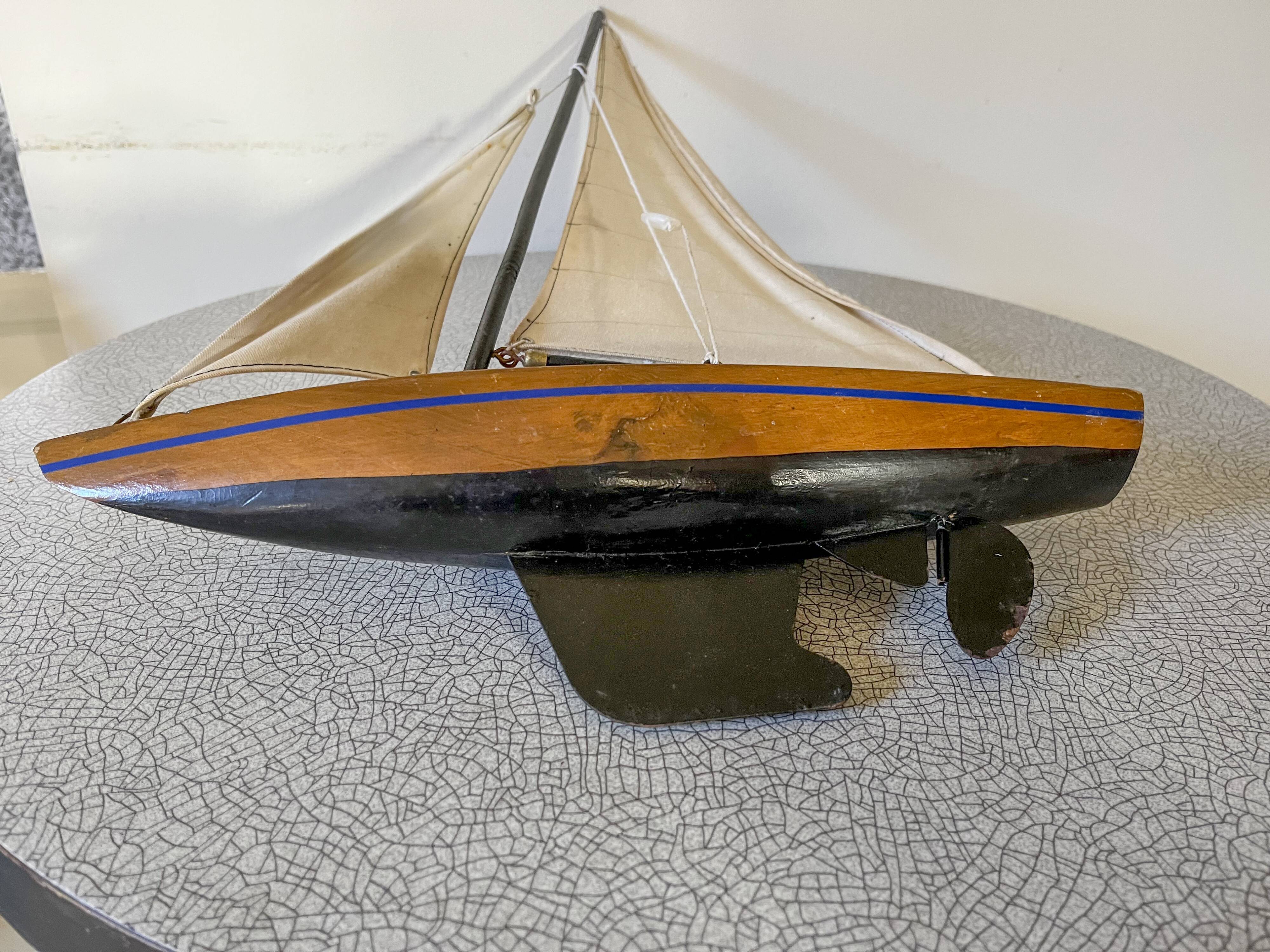 Vintage basin sailboat 60s