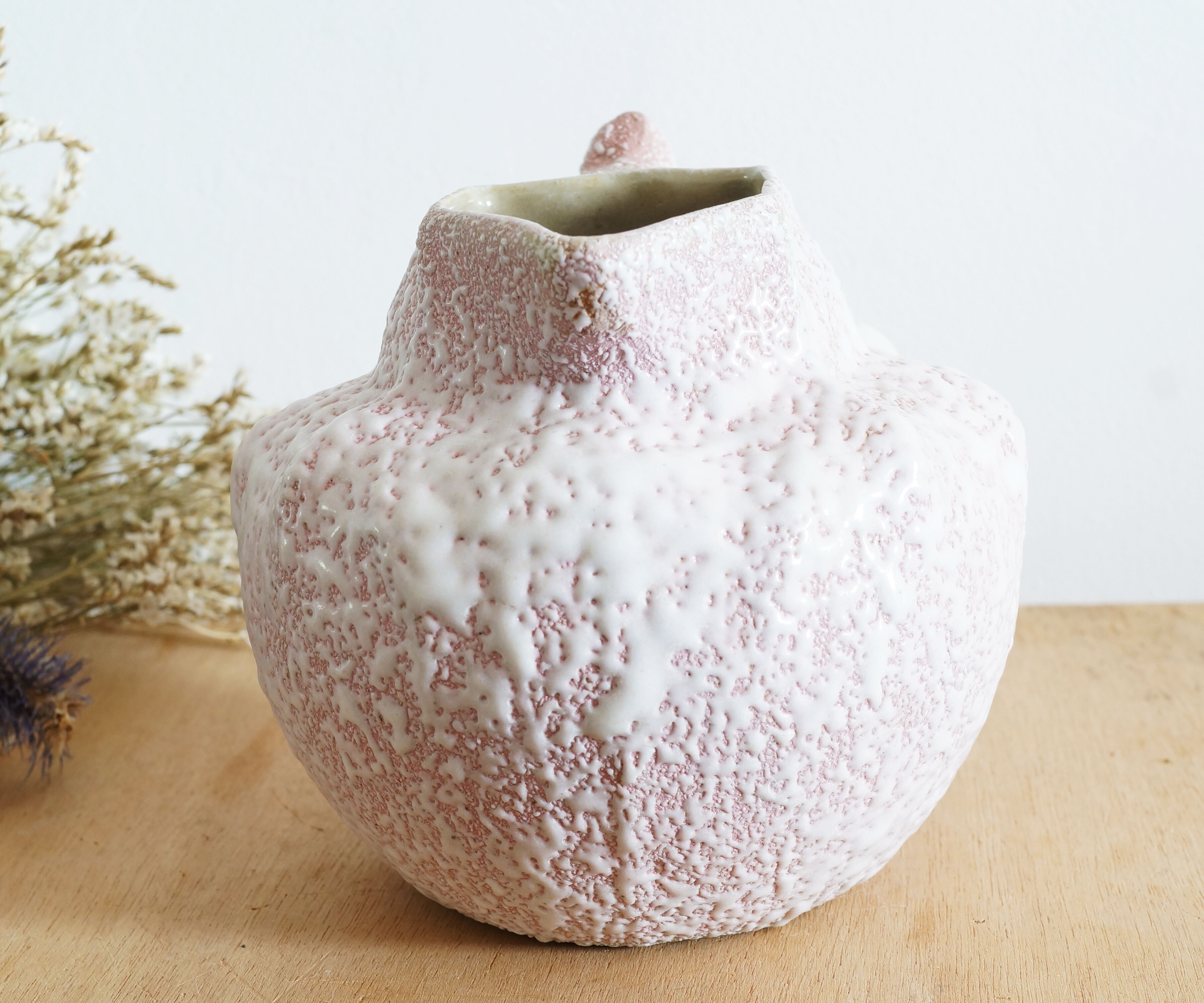 Art Nouveau ceramic pitcher with lava stone look