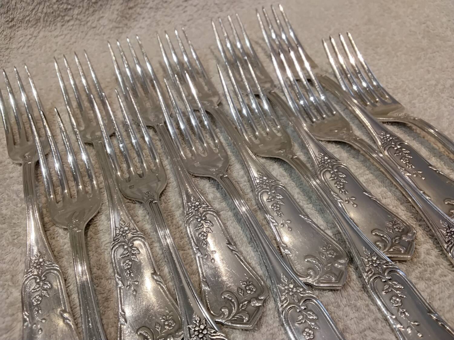 12 silver-plated metal table forks by Boulenger in the Louis XV style, demi-rich.