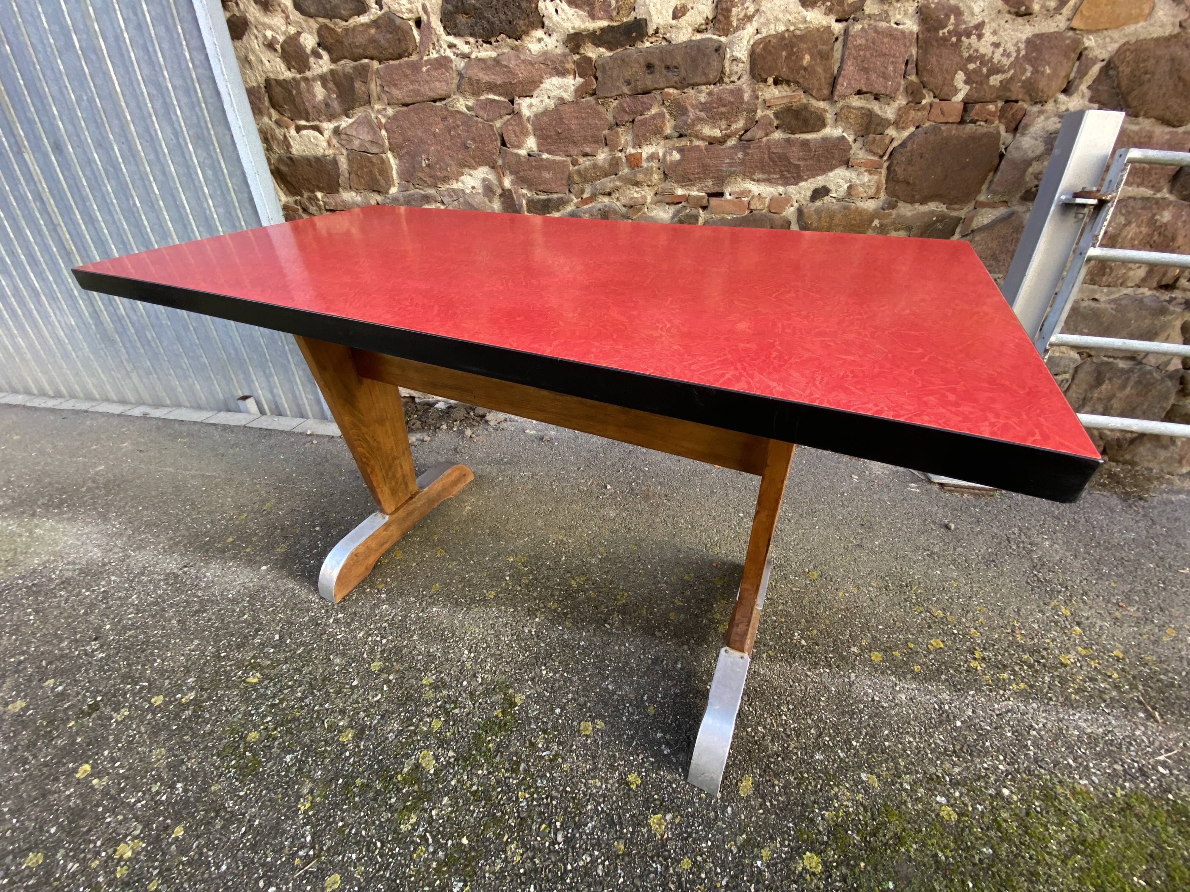 Art deco bistro coffee table covered in formica 1950
