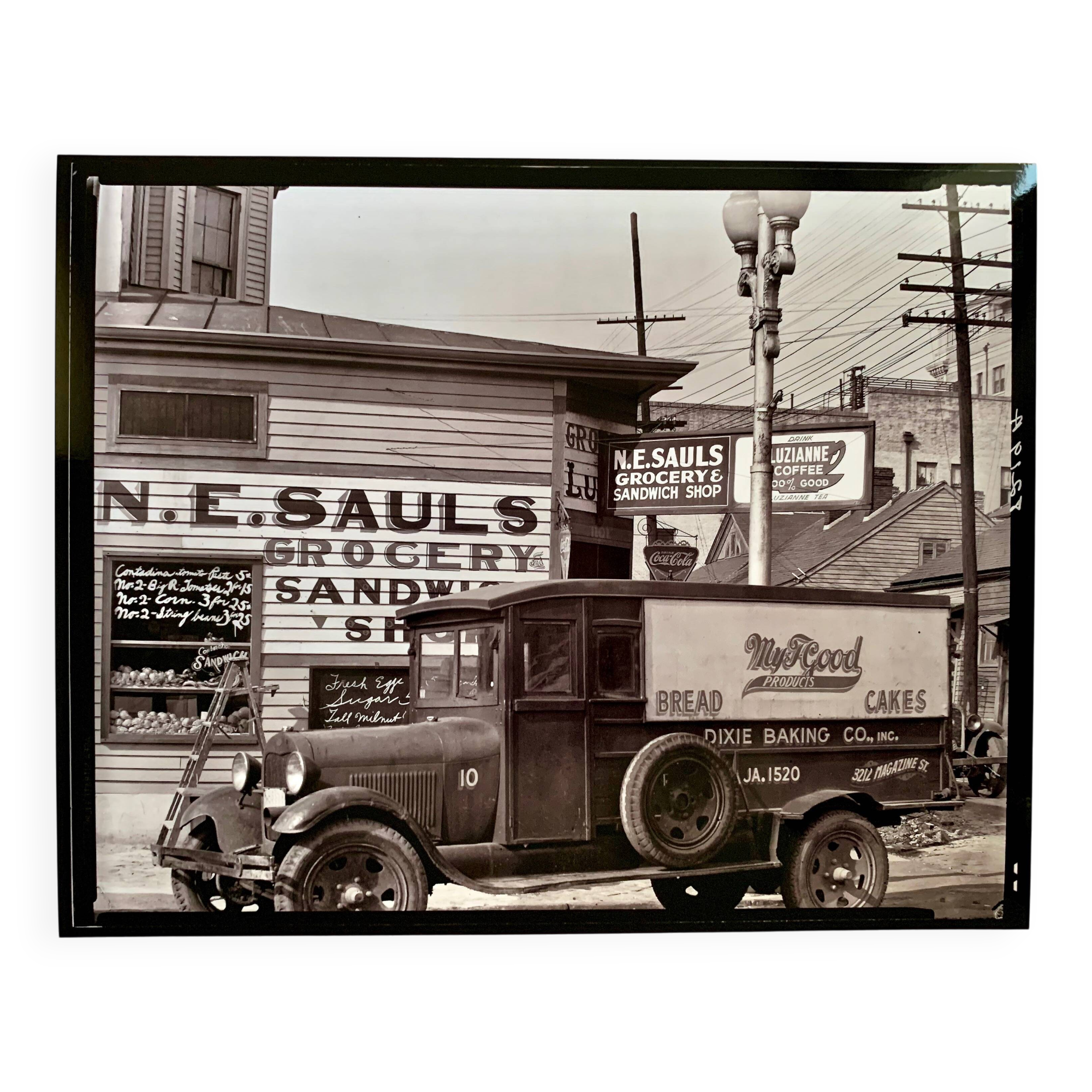 "Street corner in New Orleans, front of the NE Saul' sandwich shop