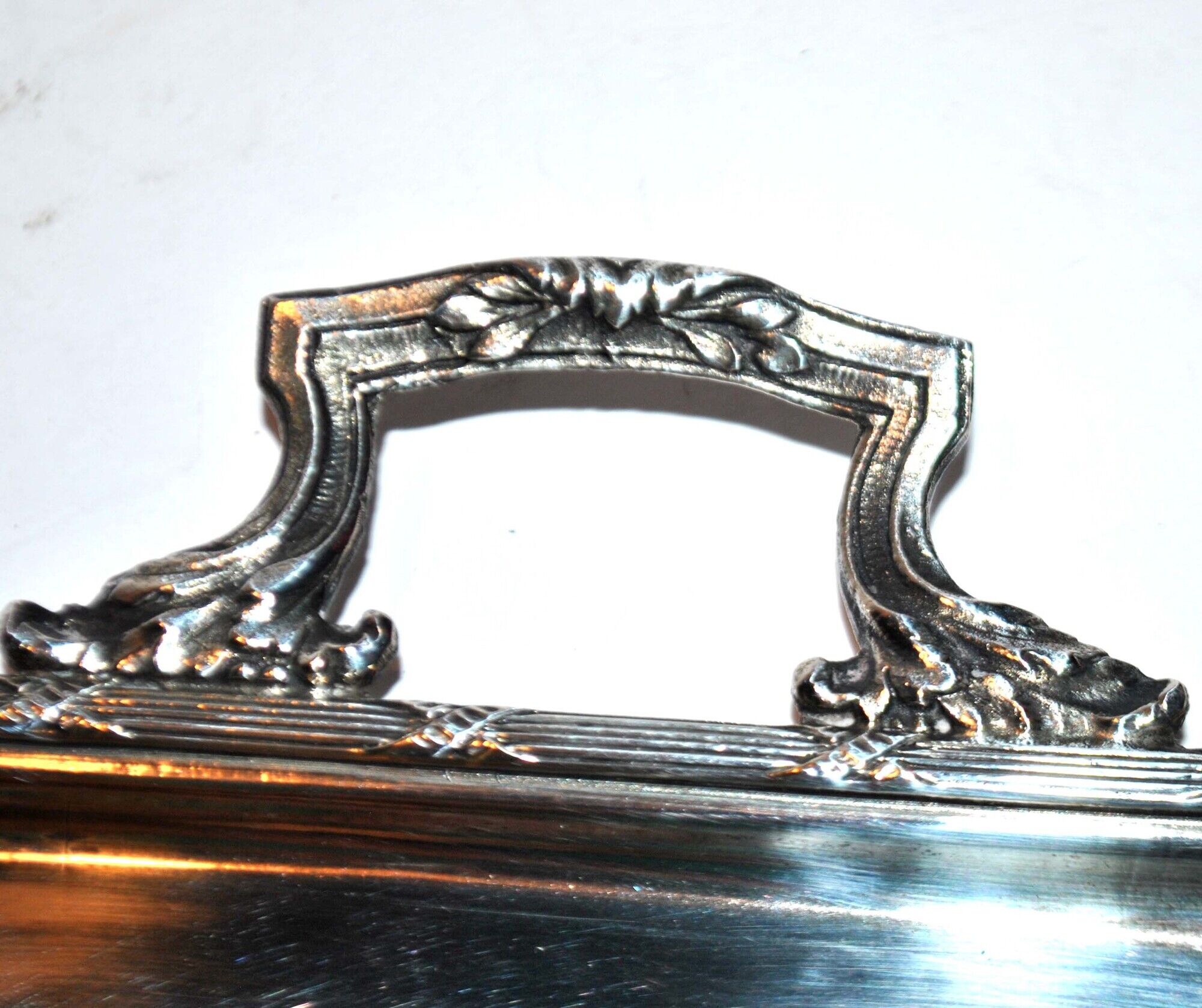 Antique silver metal top with crossed ribbons 21.5x15.5cm