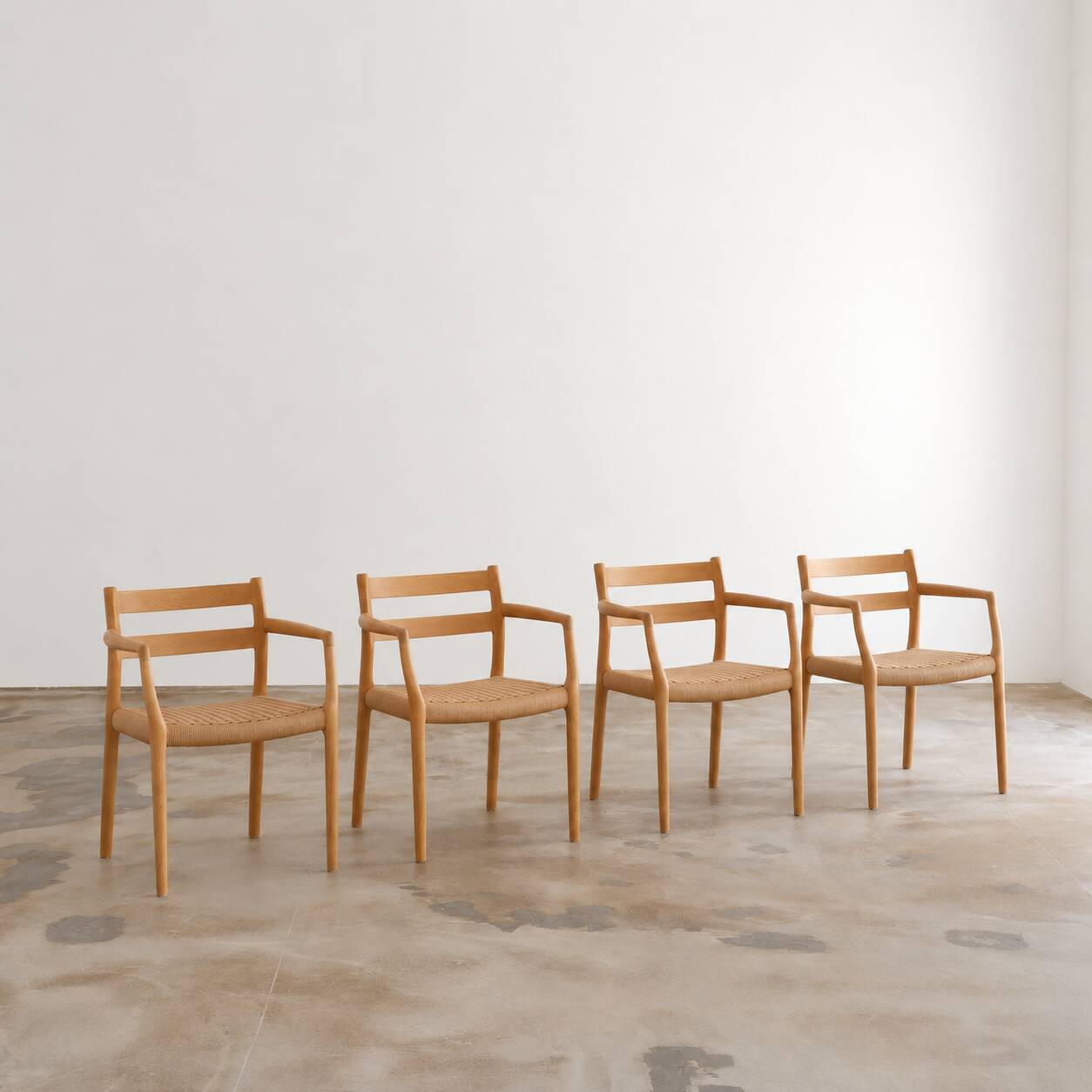Ensemble de 4 fauteuils "Mod. 67" en chêne par Niels Moller