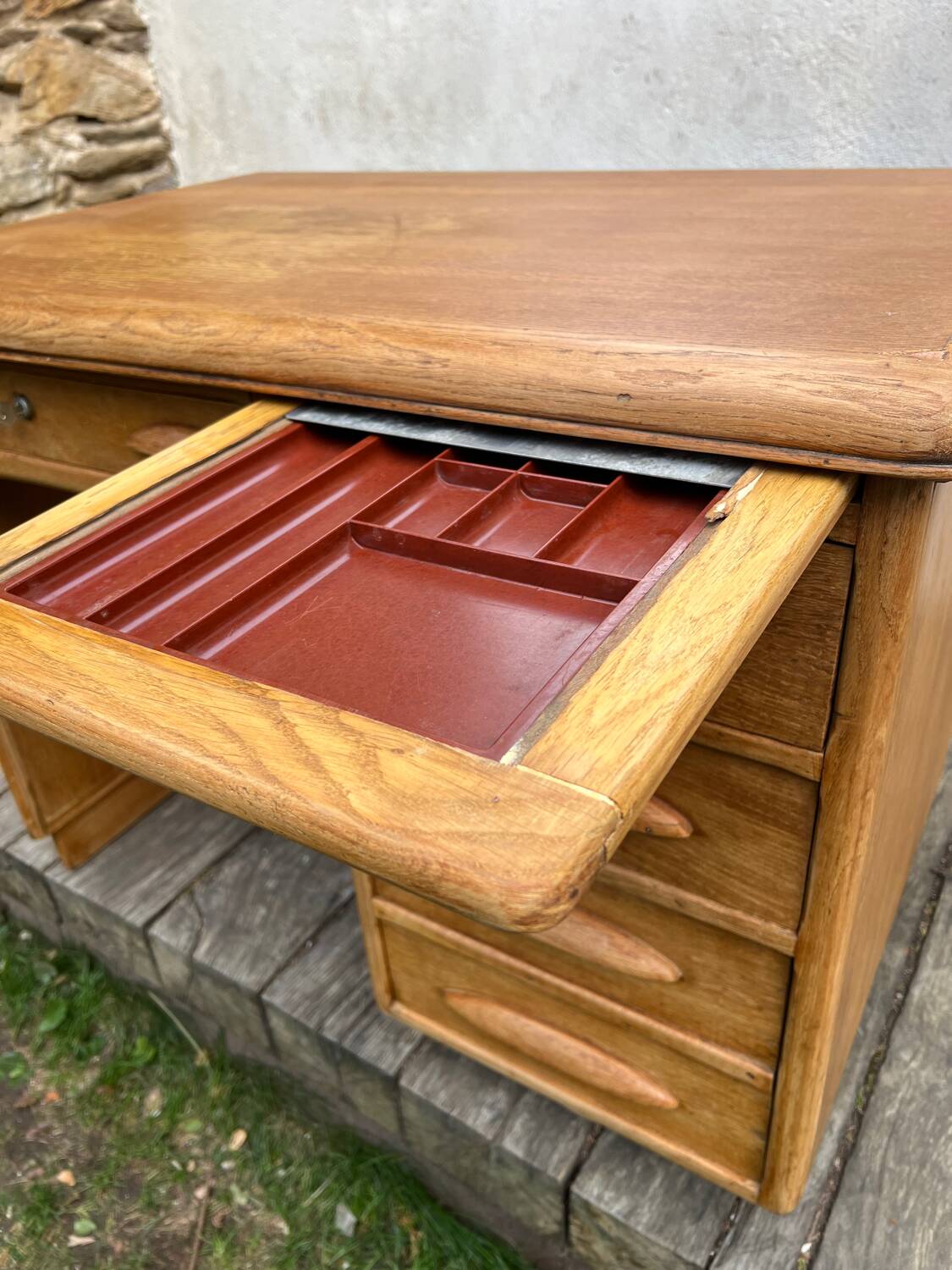 Antique light oak desk from the 1950s with 4 drawers