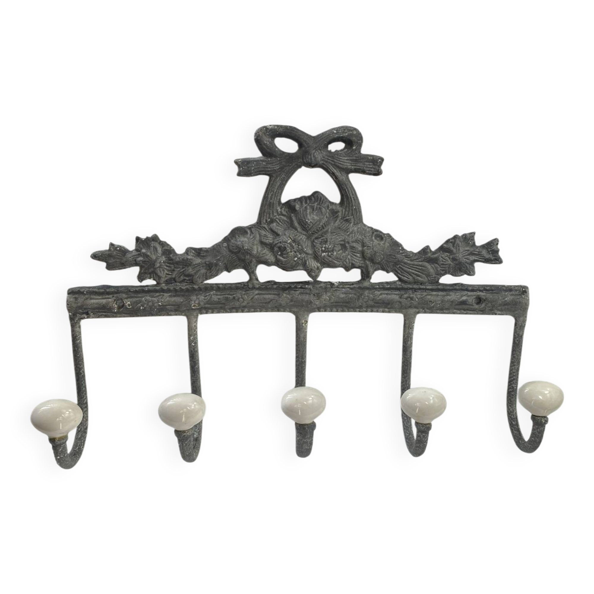 Patinated metal wall bracket and porcelain