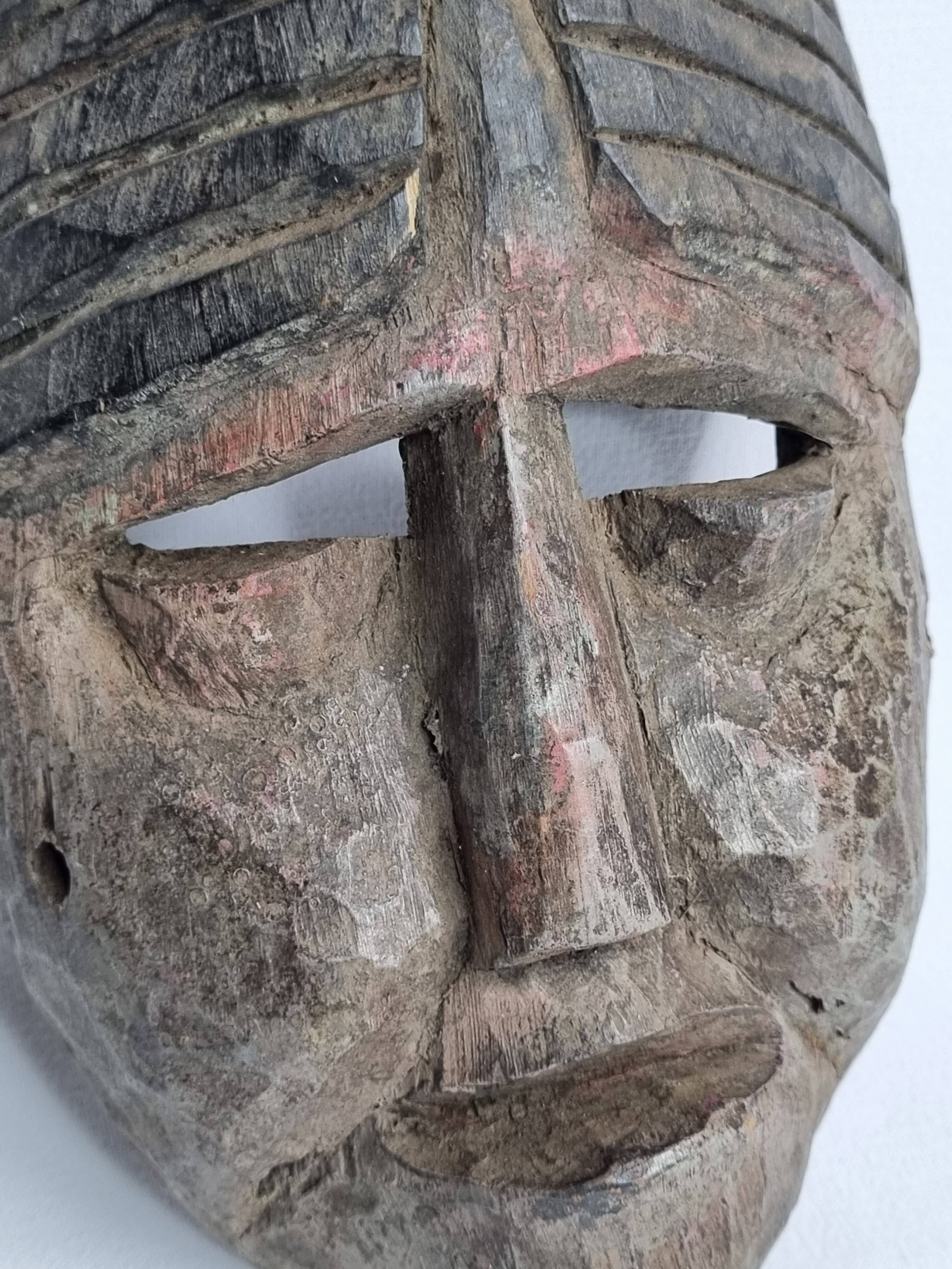 Antique ritual mask in carved wood, Himalayas, 20th century – 19 cm