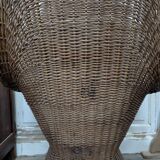 Large woven rattan armchair