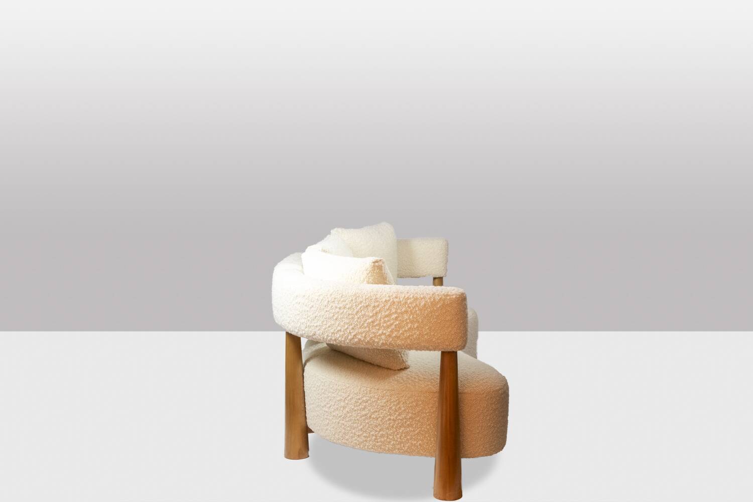 “Bean” shaped 3-seater sofa, in blond beech. Contemporary work