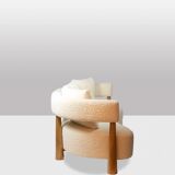 “Bean” shaped 3-seater sofa, in blond beech. Contemporary work