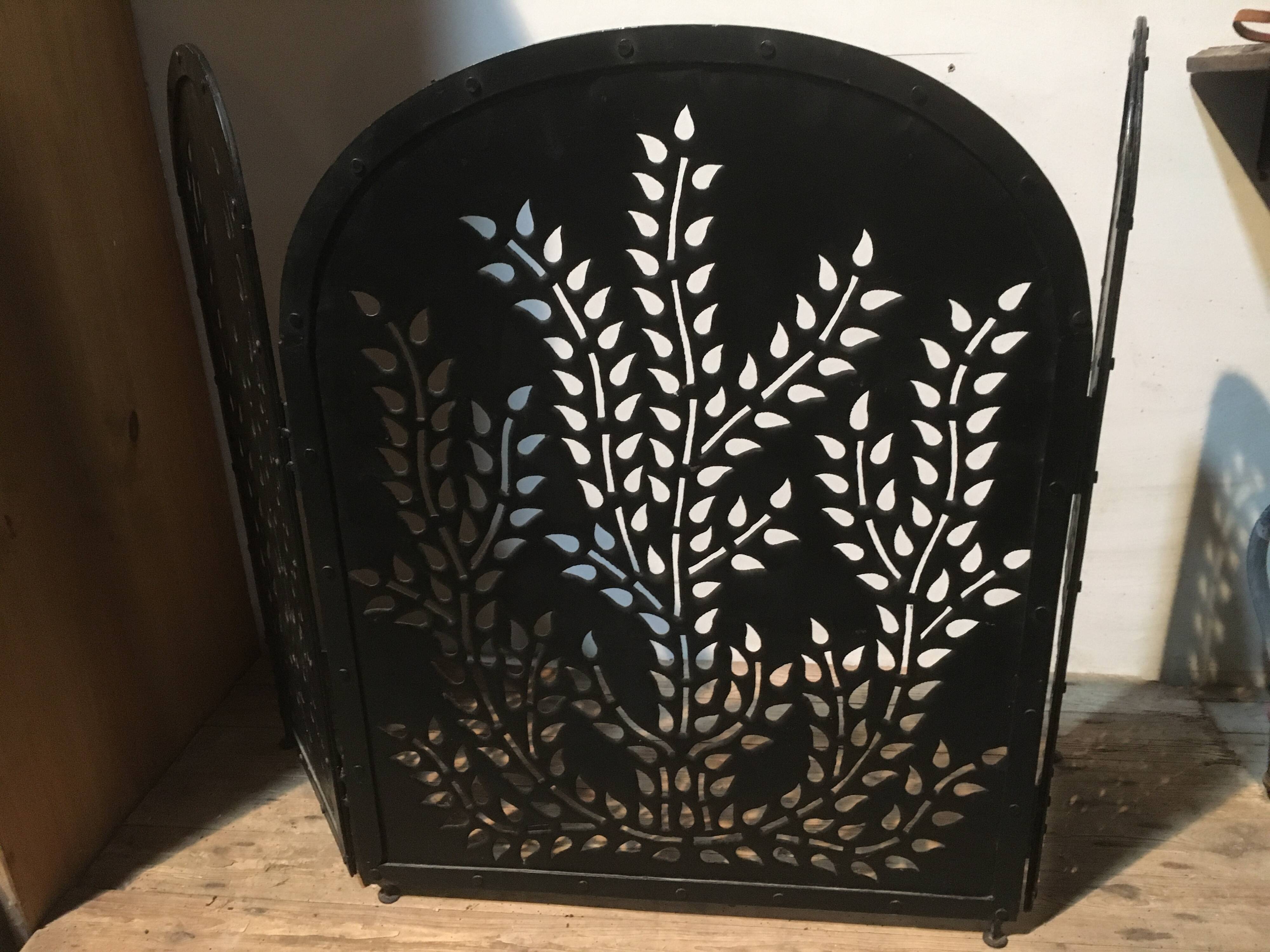 Wrought and cut metal fire screen