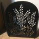 Wrought and cut metal fire screen
