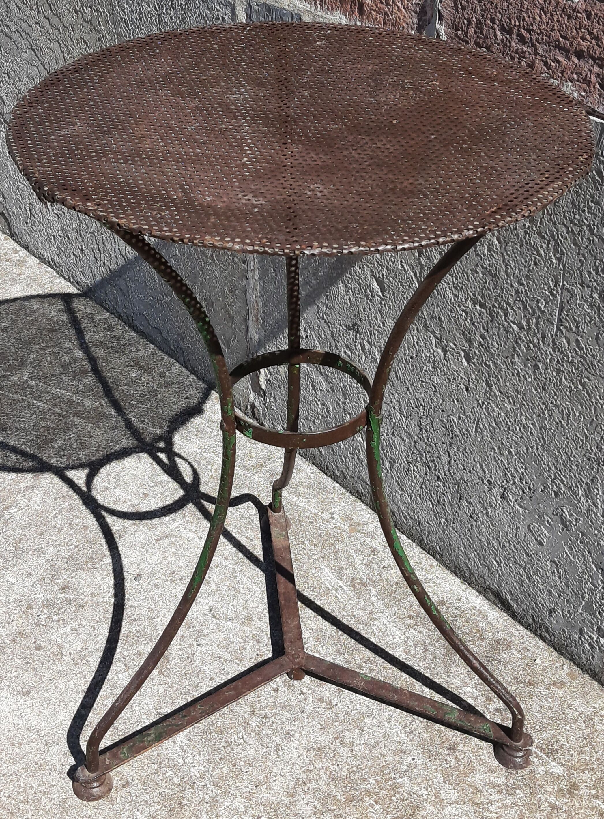 Wrought iron pedestal table