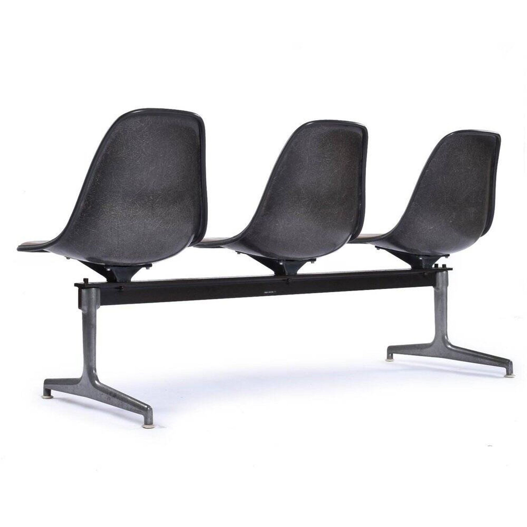 Tandem bench with brown Naugahyde pad shell chairs by Charles and Ray Eames for Herman Miller