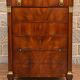 Mahogany chest of drawers – Empire / Restoration period – Black marble and bronze