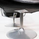Easy chair with stool upholstered with black leather of Danish design, 1970s