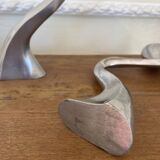 Swan candlestick pair by Matthew Hilton