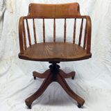 Adjustable swivel American armchair 1900