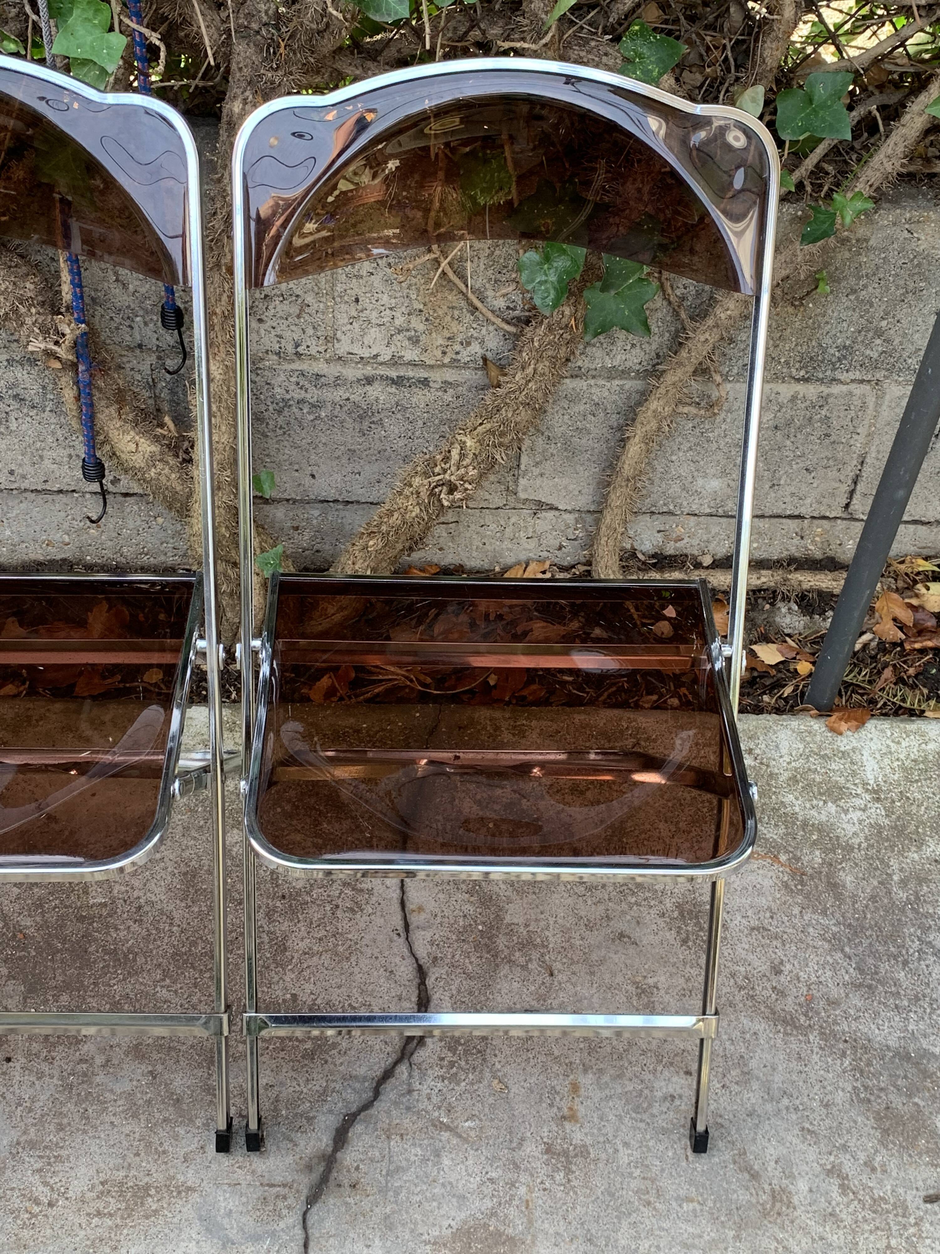 6 chaises pliantes en Plexiglas fumé et métal chrome Chaisor 1970