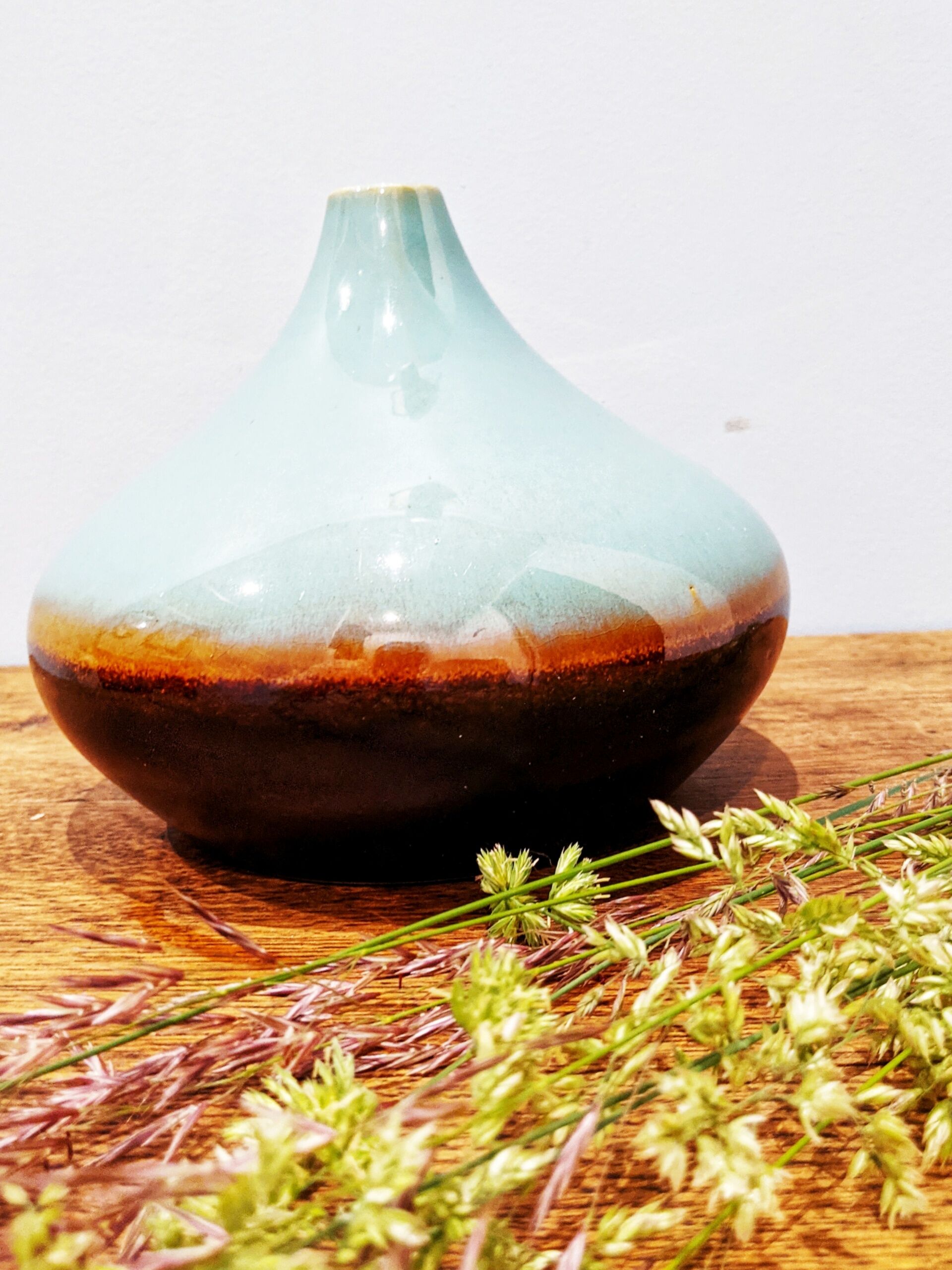 Turquoise and brown ceramic vase